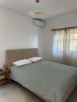 Posteľ alebo postele v izbe v ubytovaní Papanestoras Apartments