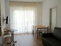TV a/nebo společenská místnost v ubytování Apartamentos Suaces