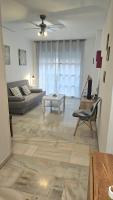 A seating area at Ideal Holiday Apartment City Center