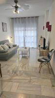 A seating area at Ideal Holiday Apartment City Center