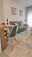 A seating area at Ideal Holiday Apartment City Center
