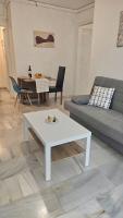 A seating area at Ideal Holiday Apartment City Center
