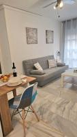 A seating area at Ideal Holiday Apartment City Center