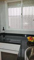 A kitchen or kitchenette at Ideal Holiday Apartment City Center