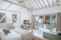 Ein Bett oder Betten in einem Zimmer der Unterkunft Selenya Talpe - Boutique Villa