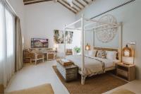 Ein Bett oder Betten in einem Zimmer der Unterkunft Selenya Talpe - Boutique Villa