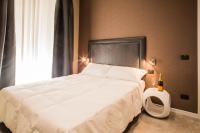 A bed or beds in a room at Roma 2B