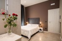A bed or beds in a room at Roma 2B