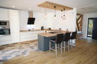 Kuchyň nebo kuchyňský kout v ubytování BluGarden Ferienapartments im Spreewald