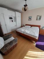 Postel nebo postele na pokoji v ubytování Apartman Peric