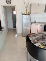 Kuchyňa alebo kuchynka v ubytovaní Apartment Marijan - Rtina