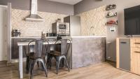 Kuchyň nebo kuchyňský kout v ubytování Apartamentos La Chaparrina del Jerte