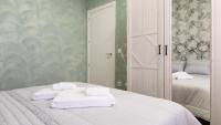 Postel nebo postele na pokoji v ubytování Apartamentos La Chaparrina del Jerte