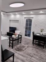 TV a/nebo společenská místnost v ubytování Rozinka apartman