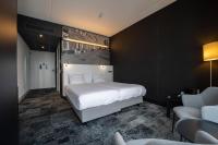 Ein Bett oder Betten in einem Zimmer der Unterkunft Fletcher Wellness-Hotel Helmond