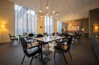 Ein Restaurant oder anderes Speiselokal in der Unterkunft Fletcher Wellness-Hotel Helmond 