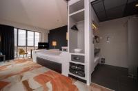 Ein Bett oder Betten in einem Zimmer der Unterkunft Fletcher Wellness-Hotel Helmond