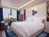 A bed or beds in a room at Sofitel Barcelona Skipper