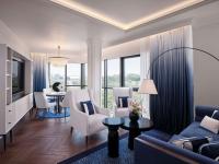 A seating area at Sofitel Barcelona Skipper