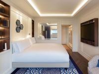 A bed or beds in a room at Sofitel Barcelona Skipper