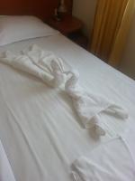 Postel nebo postele na pokoji v ubytování Family Hotel Romantik