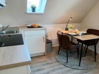 Kuchyň nebo kuchyňský kout v ubytování Haus Triton