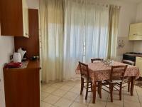 Kuchyň nebo kuchyňský kout v ubytování Appartamento Villa Circe