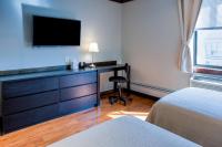 Ein Bett oder Betten in einem Zimmer der Unterkunft LIC Hotel