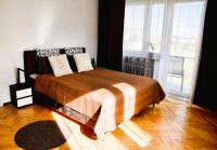 Posteľ alebo postele v izbe v ubytovaní Travel Apartament Cracow