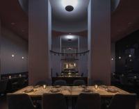 a dining room with a table and chairs at Salamander Washington DC in Washington