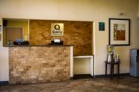 a lobby of a waiting room with a cash counter at Quality Inn Airport in Colorado Springs