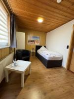 Postel nebo postele na pokoji v ubytování Hotel-Restaurant Christine