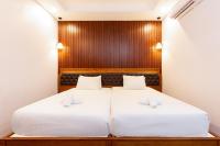 La Sonata Hotelにあるベッド