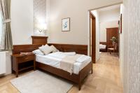 Łóżko lub łóżka w pokoju w obiekcie Hotel Kardosfa