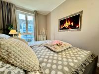 Postel nebo postele na pokoji v ubytování Ferienwohnung Nr 124 Sehnsucht-Zingst