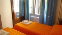 Posteľ alebo postele v izbe v ubytovaní Bed and Breakfast Adduci's House