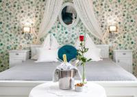 Łóżko lub łóżka w pokoju w obiekcie Boutique Hotel Szárcsa