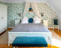 Łóżko lub łóżka w pokoju w obiekcie Boutique Hotel Szárcsa