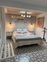 A bed or beds in a room at Vivienda Rural Rio Cerezuelo