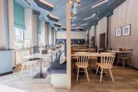 Reštaurácia alebo iné gastronomické zariadenie v ubytovaní Yggotel Mejse