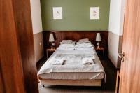 Łóżko lub łóżka w pokoju w obiekcie Hotel Yarden by Artery Hotels
