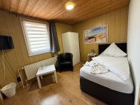 Postel nebo postele na pokoji v ubytování Hotel-Restaurant Christine