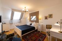 Łóżko lub łóżka w pokoju w obiekcie Boutique Hotel Szárcsa