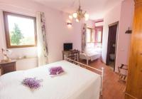 Posteľ alebo postele v izbe v ubytovaní Agriturismo Maloura