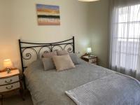 A bed or beds in a room at Los tres castells