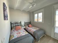 A bed or beds in a room at Los tres castells
