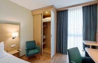 Postel nebo postele na pokoji v ubytování Sercotel Porta Barcelona
