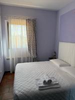 Posteľ alebo postele v izbe v ubytovaní Agriturismo Maloura