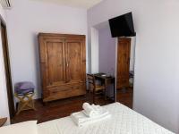 Posteľ alebo postele v izbe v ubytovaní Agriturismo Maloura