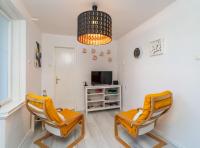 TV a/nebo společenská místnost v ubytování Apartment Butterfly